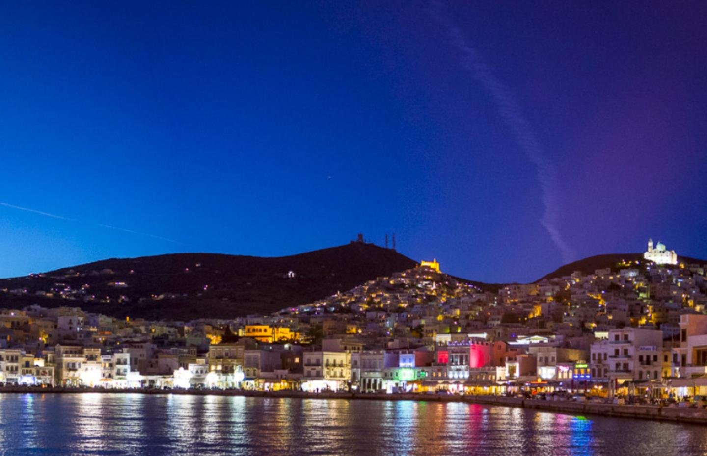 The island of Syros at night